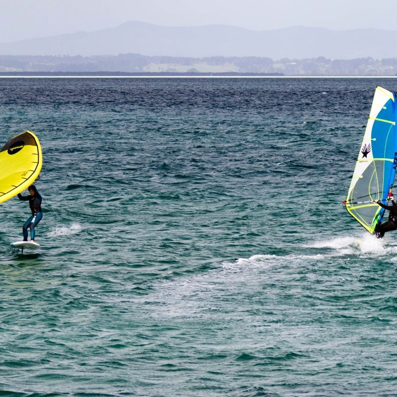 Windsurfer and wingfoiler in Northland, New Zealand