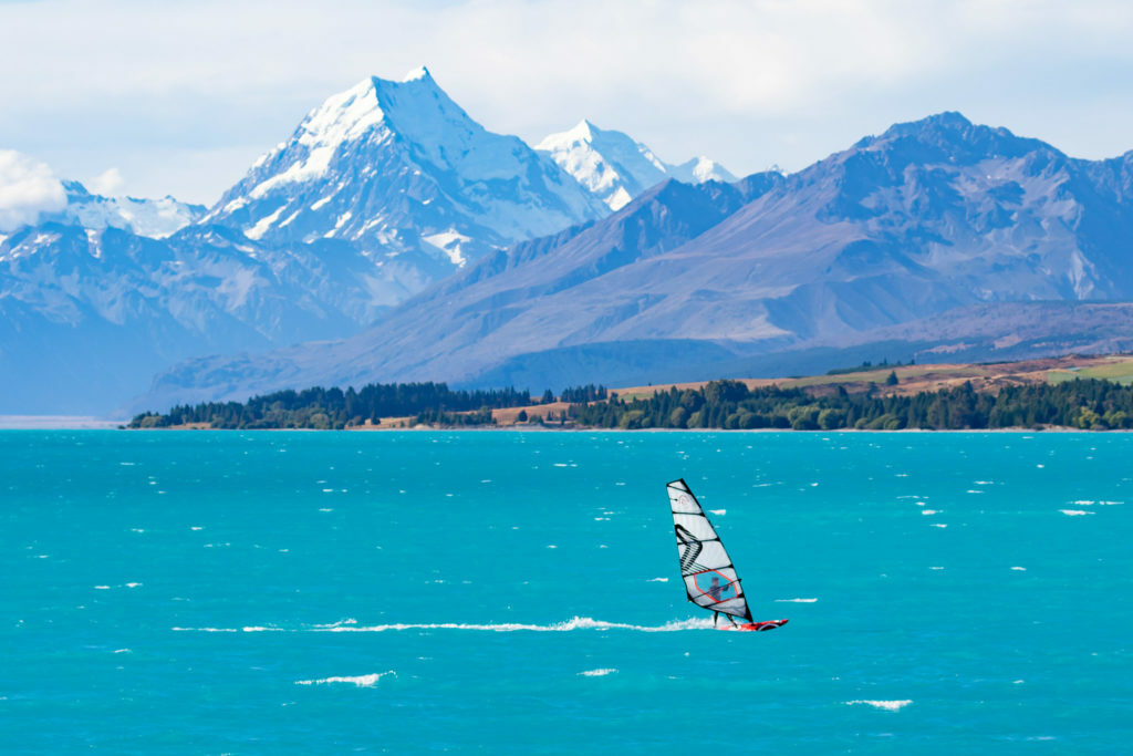 Windsurfer on Lake Pukaki with Mount Cook in the background