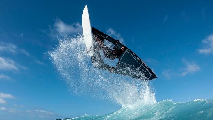 Windsurfer launches of wave in big air