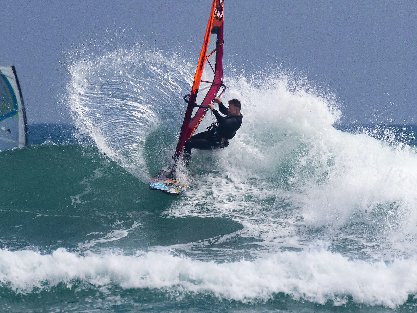 Windsurf hit lip of wave in Taranaki, New Zealand