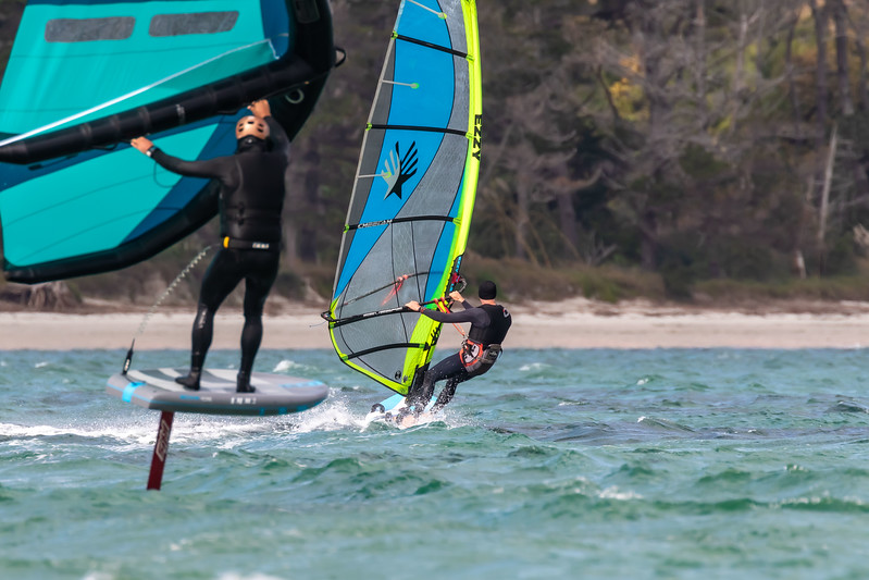 Windsurfer and wingfoiler at Rangiputa, Northland