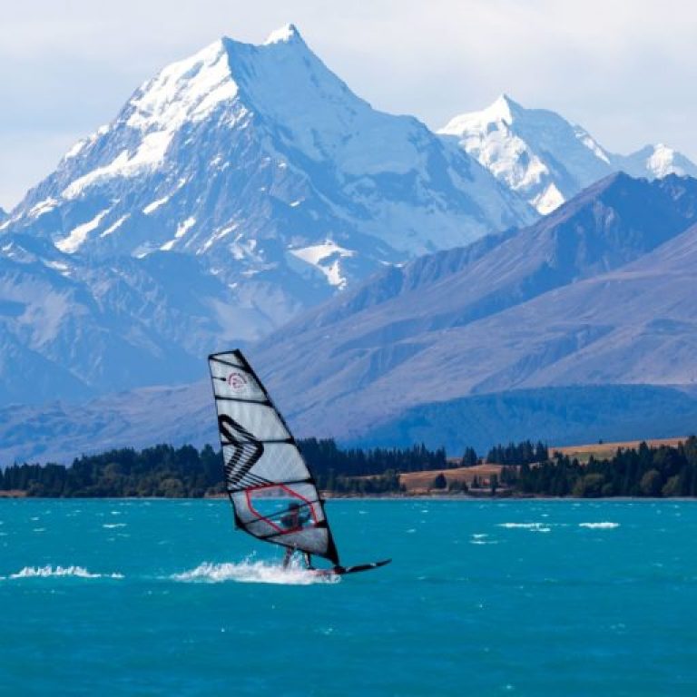 Windsurfing Lake Pukaki with Aoraki Mount Cook in background