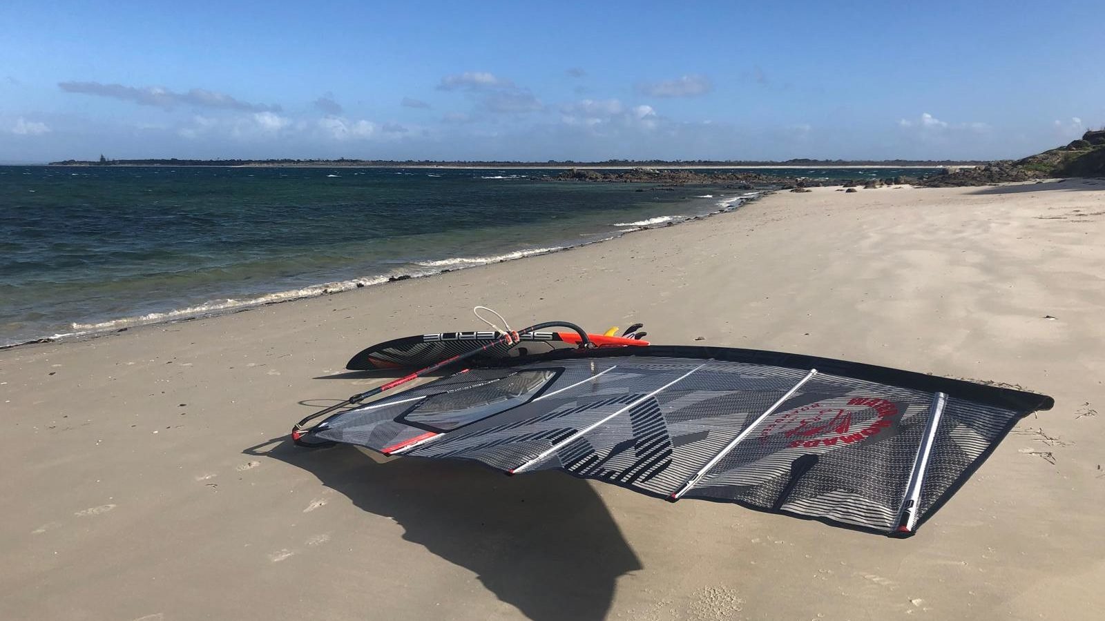 Windsurfsail on the beach in Rangiputa, Northland